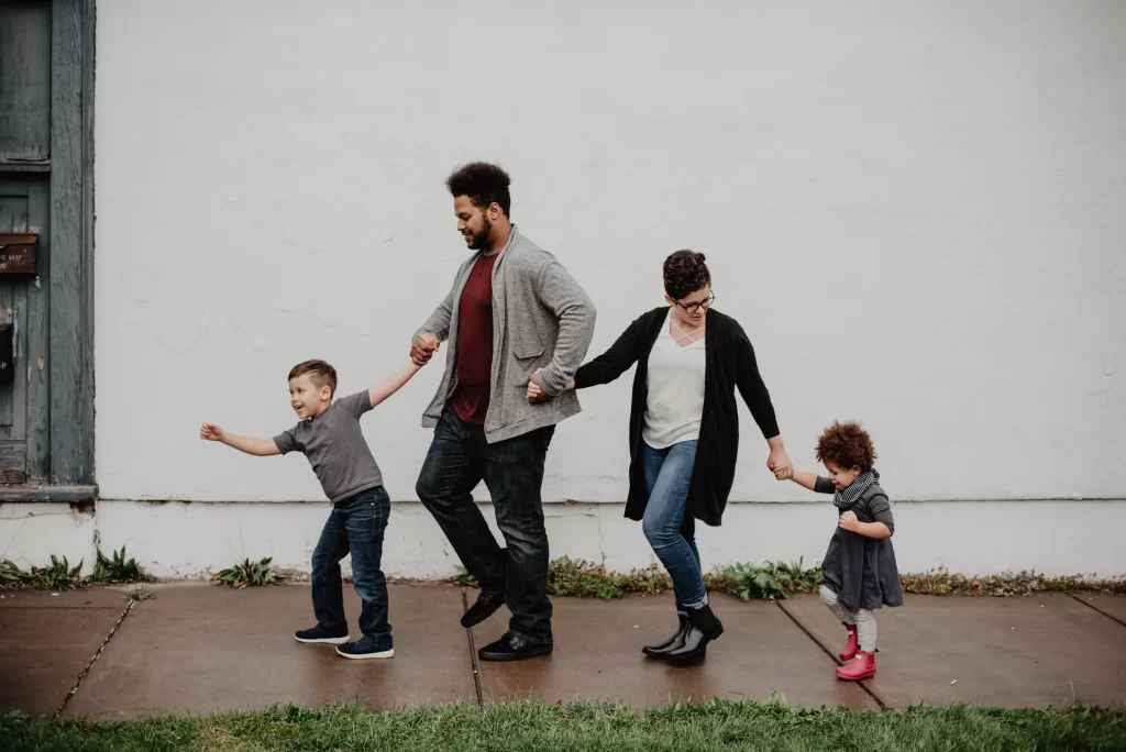 family-walking-down-street-scaled